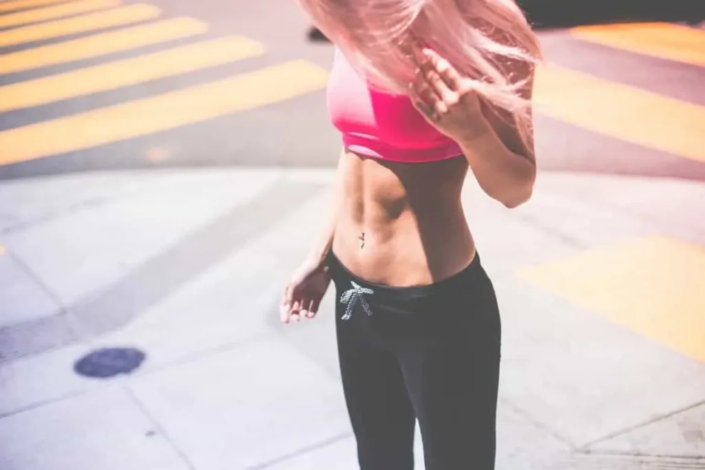 Woman with toned stomach after LA-EMS Body Sculpting Treatment Sedgley