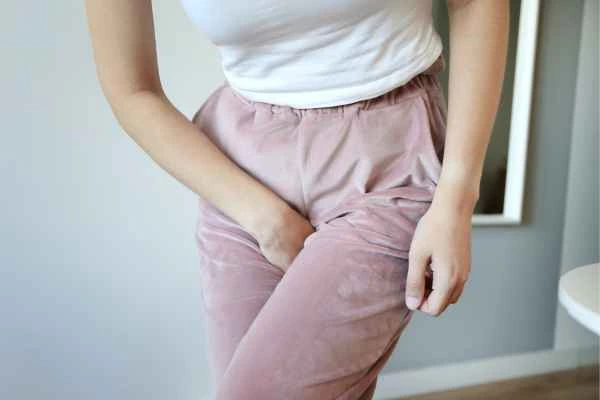 woman running for the toilet because of urinary incontinence Sedgley